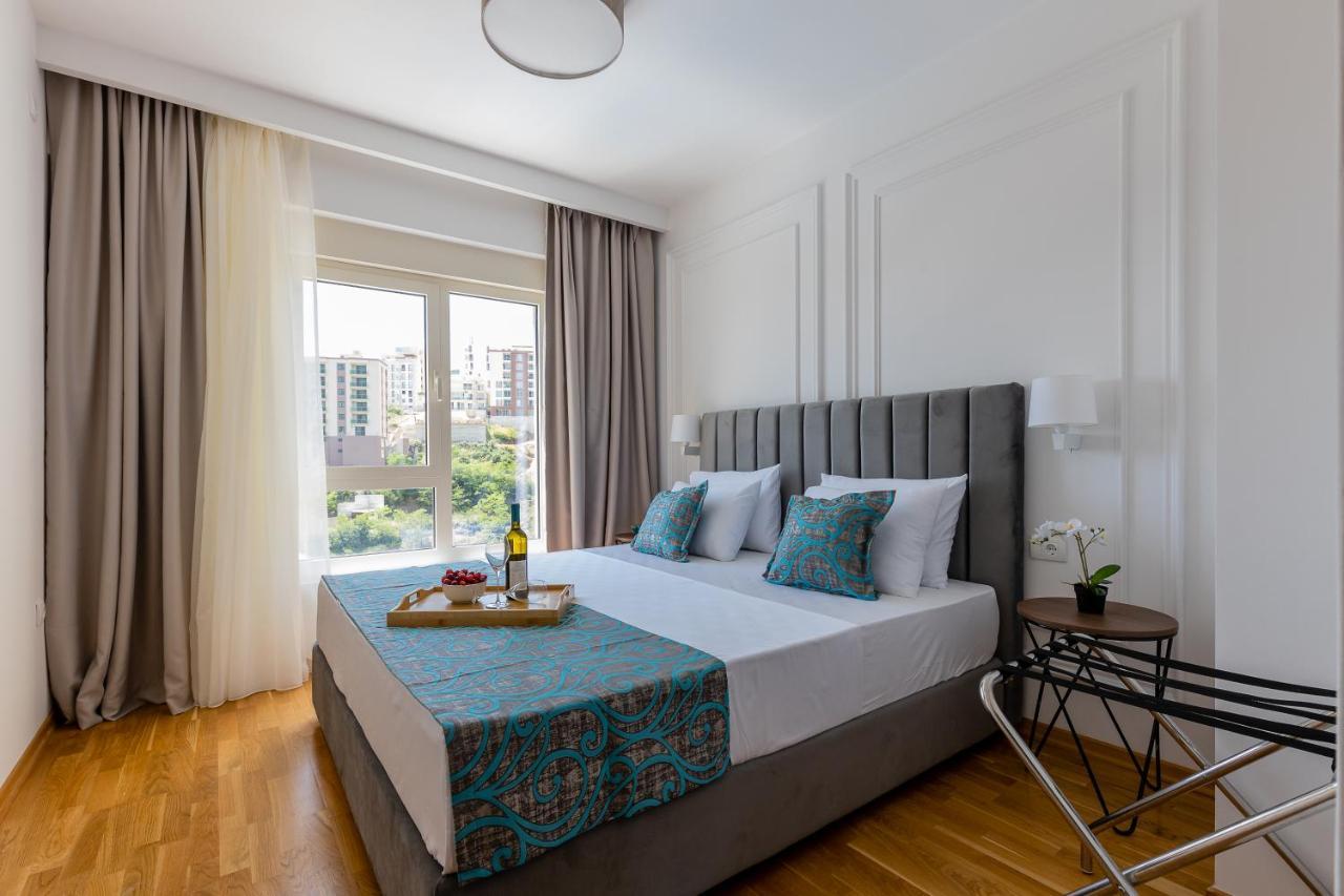 Status Max Apartments
