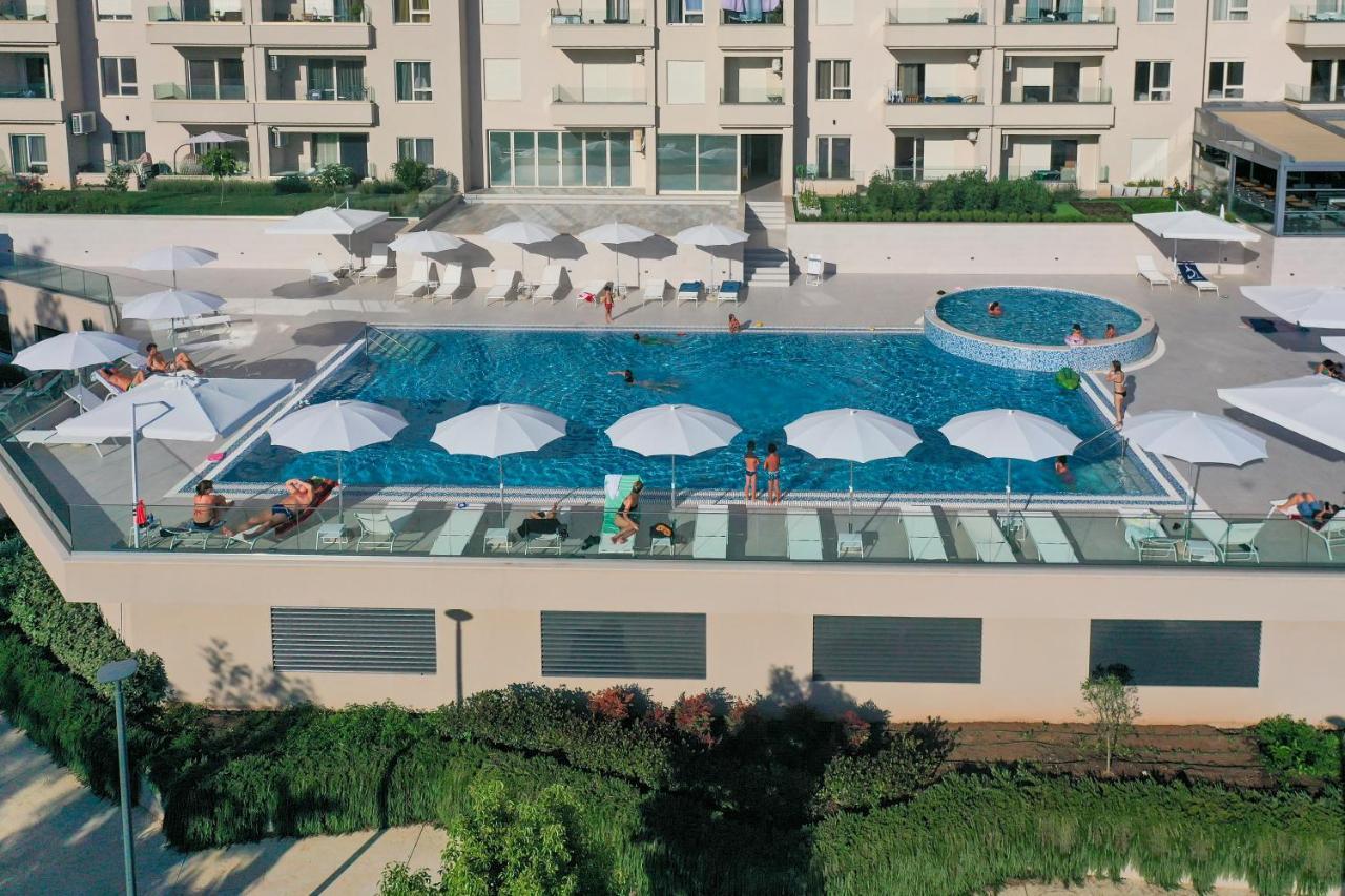 Status Max Apartments