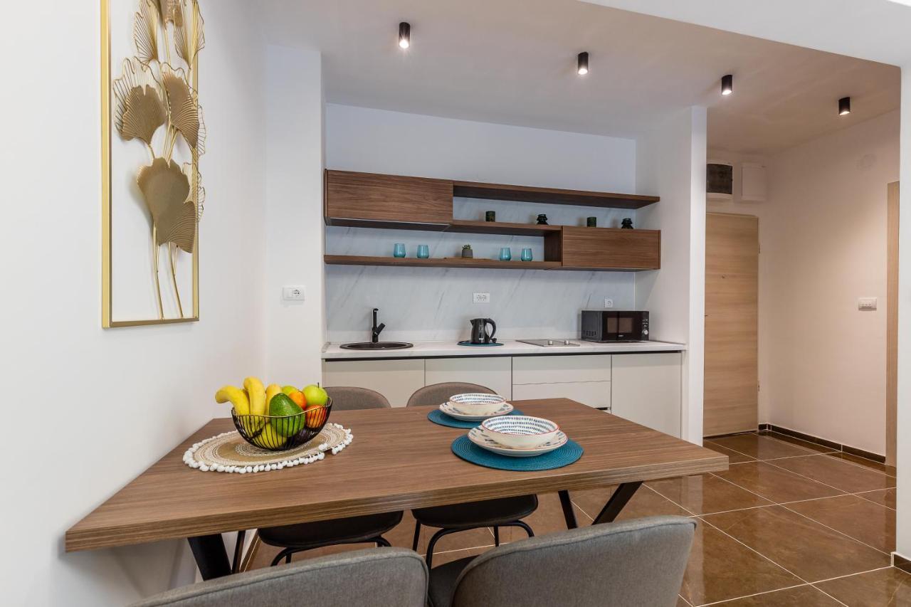 Status Max Apartments
